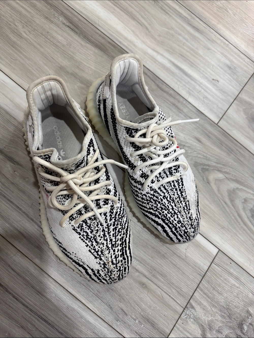 Yeezy Zebra-Pattern Knit Sneakers in White and Black